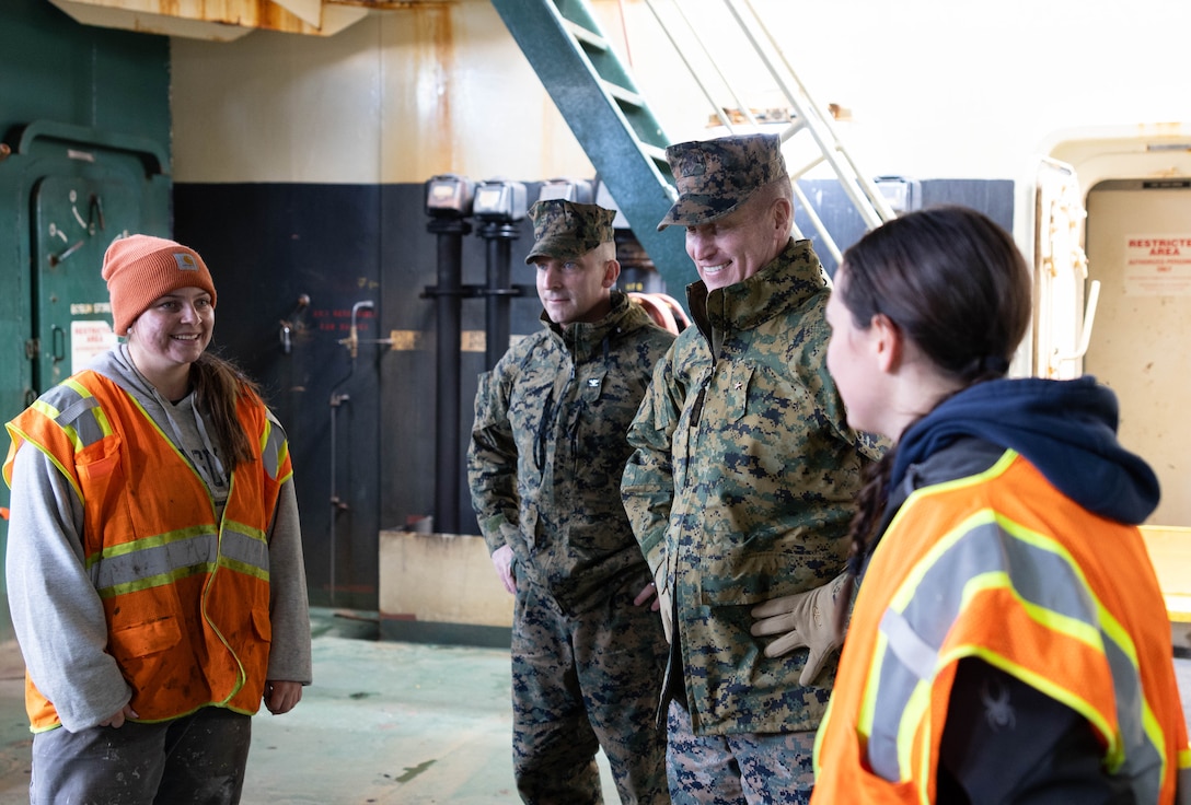 U.S. Marine Corps Brig. Gen. Kevin Collins, right, the commanding general of 3rd Marine Logistics Group, and a native of Michigan, speaks with Midshipmen from the U.S. Merchant Marine Academy aboard the Ocean Grand at MCAS Iwakuni, Japan, Jan. 29, 2024. Brig. Gen. Collins visited MCAS Iwakuni to gain insight into the capabilities of CLC-36, the MCAS Iwakuni harbor, ordnance bunkers and the Naval Family Branch Clinic Iwakuni.