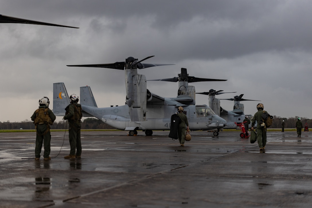 U.S. Marines with Marine Medium Tiltrotor Squadron (VMM) 774, Marine Aircraft Group 49, 4th Marine Aircraft Wing, board MV-22B Ospreys, tiltrotor aircraft, Naval Air Station Joint Reserve Base New Orleans, Belle Chasse, Louisiana, Feb. 9, 2025. The Marine Corps is the lead service for Super Bowl LIX flyover, participating in multiple events throughout the week exhibiting pride leading up to the U.S. Marine Corps 250th birthday. (U.S. Marine Corps photo by Sgt. Scott Jenkins)