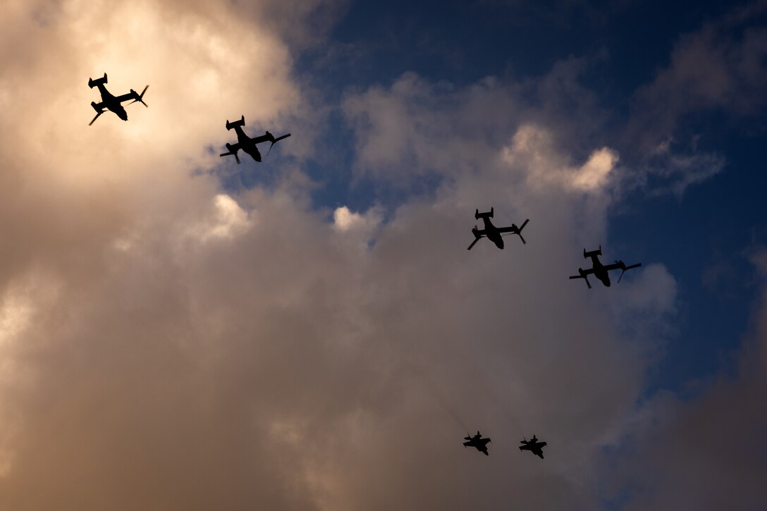 U.S. Marine Corps F-35B Lightning II aircraft with Marine Fighter Attack Squadron (VMFA) 542 and MV-22B Ospreys, tiltrotor aircraft, with Marine Medium Tiltrotor Squadron (VMM) 774 and VMM-764 perform a formation flight over New Orleans, Feb. 7, 2025. The Marine Corps is the lead service for Super Bowl LIX flyover, participating in multiple events throughout the week exhibiting pride leading up to the U.S. Marine Corps 250th birthday. (U.S. Marine Corps photo by Lance Cpl. Van Hoang)
