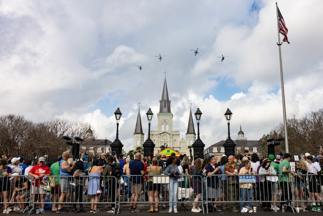 U.S. Marine Corps aircraft with Marine Light Attack Helicopter Squadron (HMLA) 773 fly over Jackson Square during the Super Bowl LIX parade, New Orleans, Feb. 8, 2025. The Marine Corps is the lead service for Super Bowl LIX, participating in multiple events throughout the week exhibiting pride leading up to the U.S. Marine Corps’ 250th birthday. (U.S. Marine Corps photo by Sgt. Scott Jenkins)