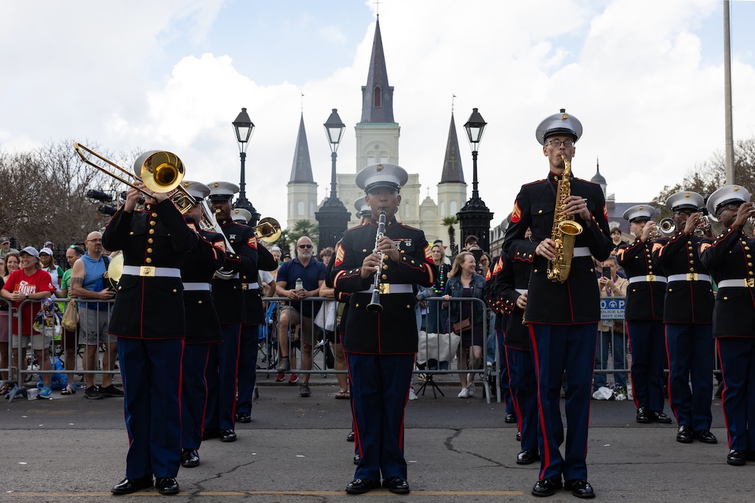 The Marine Forces Reserve Band performs at the Super Bowl LIX parade in Jackson Square, New Orleans, Feb. 8, 2025. The Marine Corps is the lead service for Super Bowl LIX, participating in multiple events throughout the week exhibiting pride leading up to the U.S. Marine Corps 250th birthday. (U.S. Marine Corps photo by Sgt. Scott Jenkins)