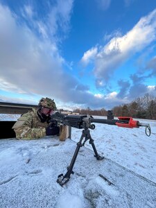 Airman aims his weapon