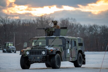 Airman aims his weapon