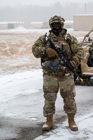 Airman stands guard at entry control point