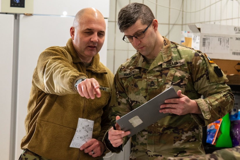 U.S. Army Lt. Col. Urlin Mathews, brigade surgeon for the Headquarters and Headquarters Company, 56th Stryker Brigade Combat Team, 28th Infantry Division, Pennsylvania National Guard in support of the Joint Multinational Training Group-Ukraine mission and developer of the mass casualty triage wargame, supervises 56th SBCT combat medic specialists as they execute the wargame exercise at Grafenwoehr Training Area, Germany, Jan. 22, 2025.