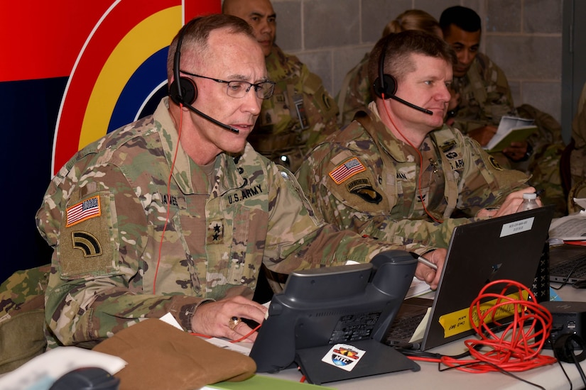 Maj. Gen. Jack A. James Jr. (left), the commander of the New York National Guard’s 42nd Infantry Division, conducts a commander’s update brief with the XVIII Airborne Corps during the division’s Warfighter 25-3 exercise at Fort Indiantown Gap, Pa., Jan. 30, 2025. The multi-day exercise, built around computer combat simulations against an experienced opposing force, tests the ability of division and brigade commanders and staff to conduct the tasks they would execute in battle. (U.S. Army photo by Master Sgt. Warren W. Wright Jr., 42nd Inf. Div. public affairs)