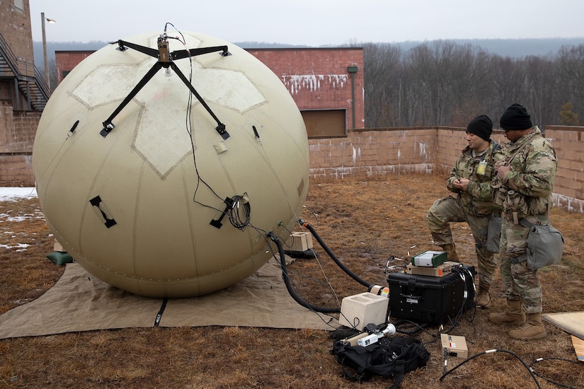 U.S. Army Soldiers from the New York National Guard’s 42nd Infantry Division work with an inflatable, transportable tactical command communications system during the division’s Warfighter 25-3 exercise at Fort Indiantown Gap, Pa., Jan. 31, 2025. The multi-day exercise, built around computer combat simulations against an experienced opposing force, tests the ability of division and brigade commanders and staff to conduct the tasks they would execute in battle. (U.S. Army photo by Staff Sgt. Andrew Valenza, 42nd Inf. Div. public affairs)