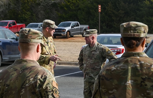 Leadership stand and talk with each other
