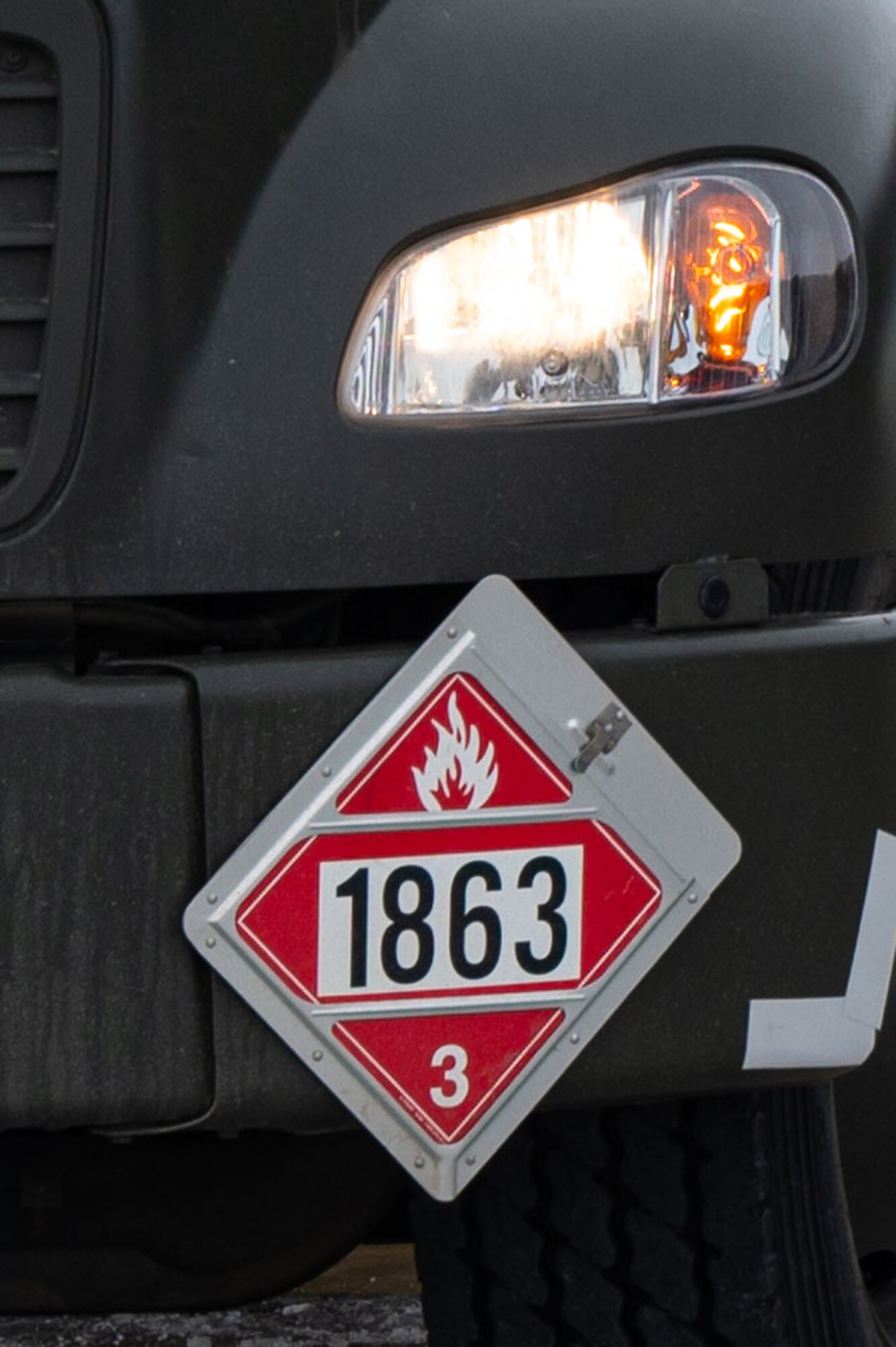 A refueling vehicle sits during a refueling at Minot Air Force Base, North Dakota, Jan. 29, 2025. These vehicles distribute petroleum, oil and lubricant to aircraft and vehicles across the flight line. (U.S. Air Force photo by Airman 1st Class Padilla)