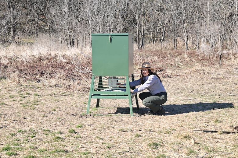 Elyssa Mendez, a park ranger with the U.S. Army Corps of Engineers, Fort Worth District’s Proctor Lake, checks on an automatic deer feeder in one of the many wildlife management areas that surround the lake. Mendez serves as the hunting coordinator for the lake and calls the outdoors her second office.