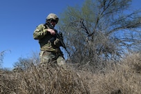 Texas Army National Guard Spc. Marc Lopez checks for migrant activity and evidence of illegal border crossings in a wooded area along the southern border near McAllen, Texas, as part of the Texas Tactical Border Force Feb. 03, 2025. The TTBF comprises Texas National Guard members in state active duty status who work with state and federal law enforcement officials, including U.S. Border Patrol, to deter, detect and stop illegal border crossings and to interdict transnational criminals.