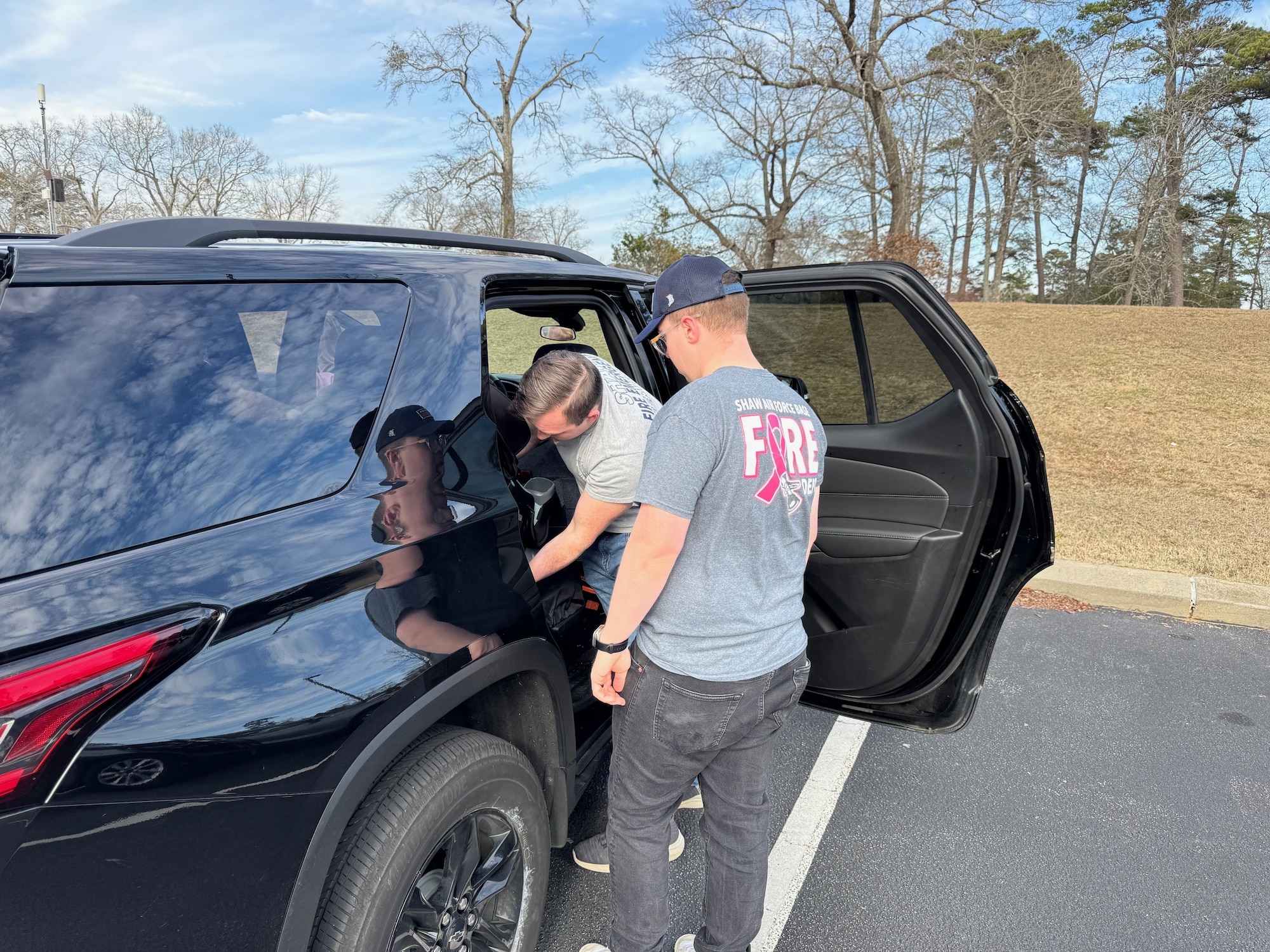 U.S. Air Force Senior Airmen Logan Smith, right, and Christian Moneypenny, left, 20th Civil Engineer Squadron Fire and Emergency Services operators, learn how to inspect car seats during a week-long Child Passenger Safety Technician class at Shaw Air Force Base, S.C., Jan. 31, 2025. Smith and Moneypenny, along with 14 other personnel from the 20th CES FES, Lexington Fire, Dorchester County Fire, Lexington and Sumter County Sheriff’s Office, and Prisma Health, were added to the ranks of the 1,100 current CPSTs in the state of South Carolina. (Courtesy photo)