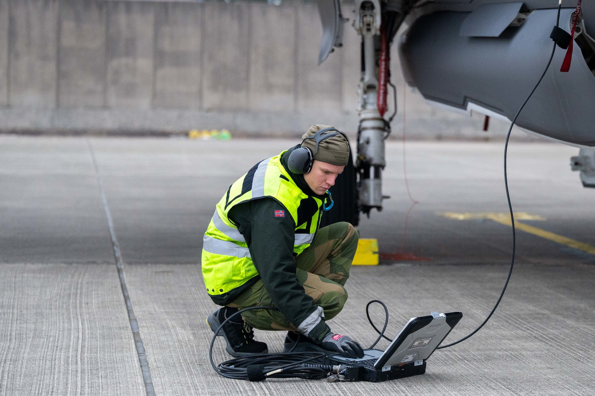 Airmen checks F-35.