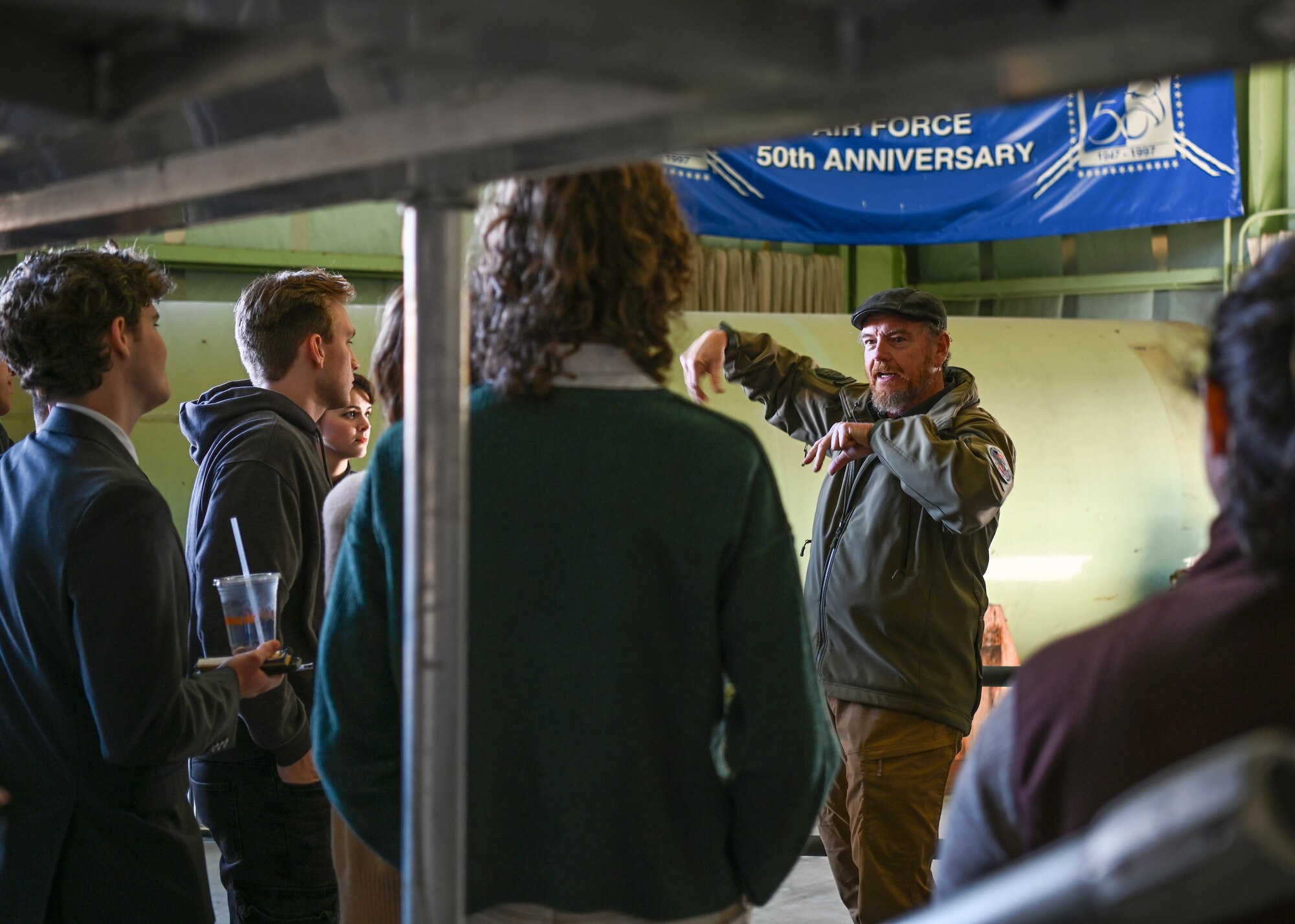A Vandenberg Space and Missile Center director, explains launch and base history to the members of the Santa Barbara City College Rocket Club during a tour at Vandenberg Space Force Base.