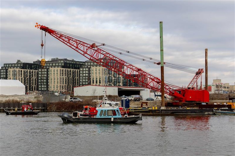The U.S. Army Corps of Engineers, Baltimore District, U.S. Coast Guard and U.S. Navy’s Supervisor of Salvage and Diving crews demobilize equipment following completion of wreckage removal from the Potomac River section affected by the Jan. 29 midair collision of an American Airlines regional jet and a U.S. Army Black Hawk helicopter near Ronald Reagan Washington National Airport.