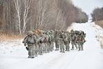 Air National Guard Airmen conduct a 6-mile ruck as part of the Air National Guard's Cold Weather Operations Course at Camp Ripley Training Center, Minn., Feb. 4, 2025. Seventy participants representing 37 wings from 27 states completed the six-day, five-night field training exercise.