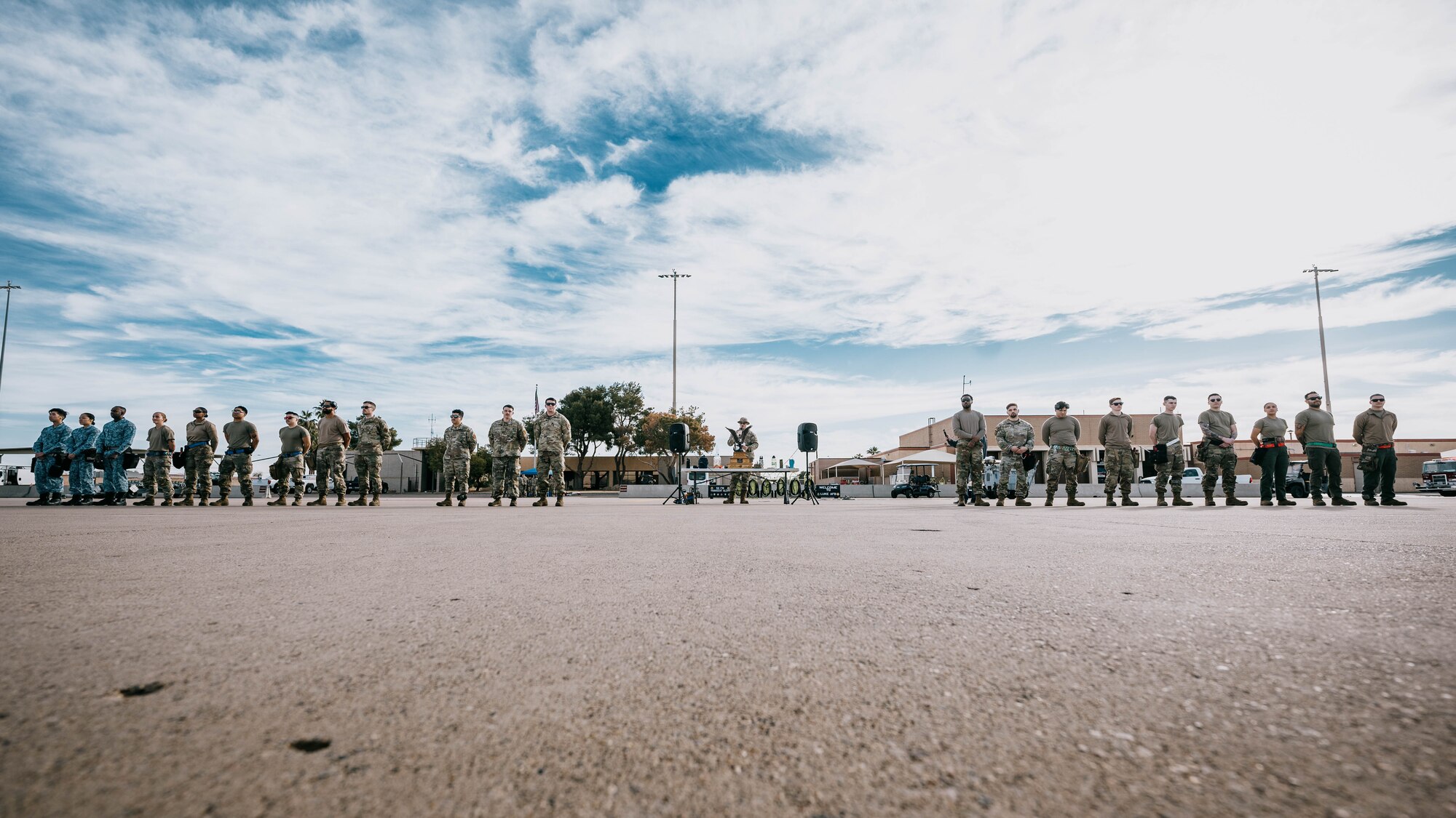 56th Fighter Wing personnel stand in-line before the annual weapons load competition.