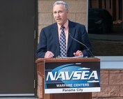 Dr. Joseph Lopes, Naval Surface Warfare Center Panama City Division Subsea and Seabed Warfare and Maritime Operations Department deputy, addresses the crowd before the ceremonial ribbon-cutting of Naval Surface Warfare Center Panama City Division's new Acoustic Test Facility and Instrumentation building, Feb. 5. Lopes was one of the visionaries behind this state-of-the-art facility. (U.S. Navy photo by Eddie Green)