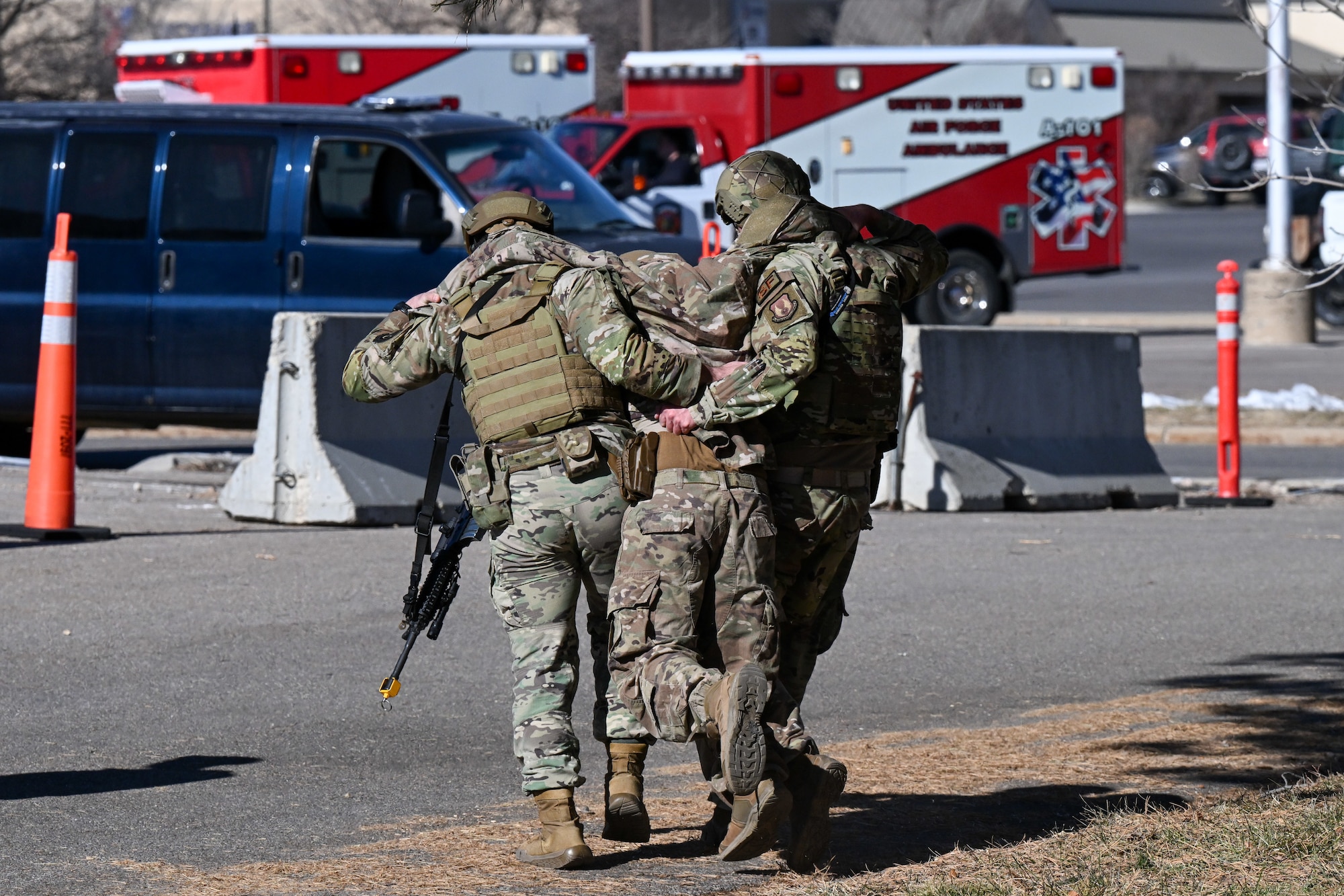 Two Airman carry a wounded actor