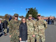 From left, U.S. Marine Corps 2nd Lt. Timothy Lovewell, Robin Lovewell, U.S. Air Force Col. Jim Lovewell and U.S. Air Force 2nd Lt. Nathan Lovewell pose for a family photo on Marine Corps Base Quantico, Virginia.
