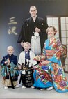 From left, Nathan Lovewell, Timothy Lovewell, Jim Lovewell and Robin Lovewell pose for a family photograph at Misawa, Japan, 2003.