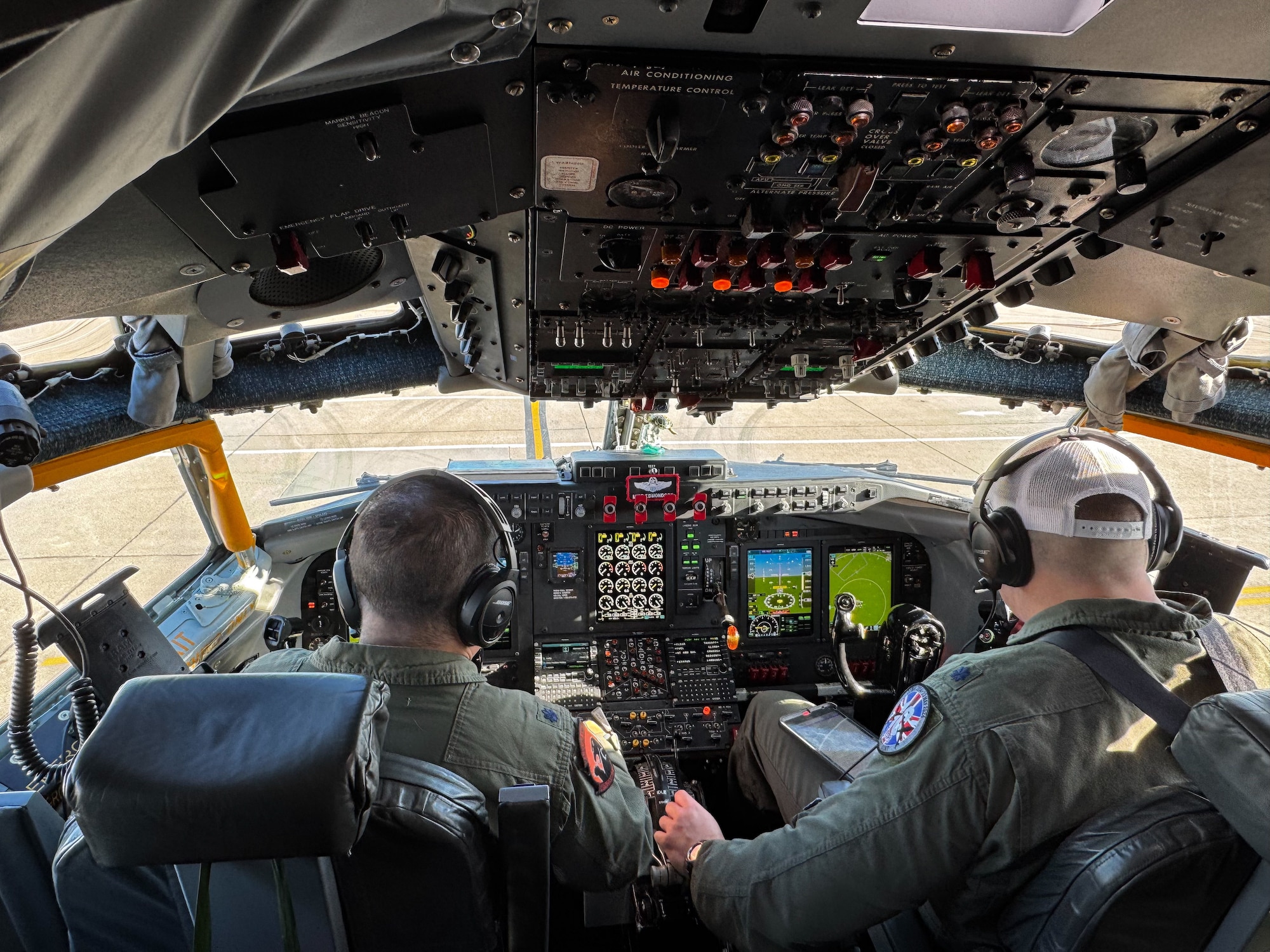 People sit in the cockpit of an aircraft