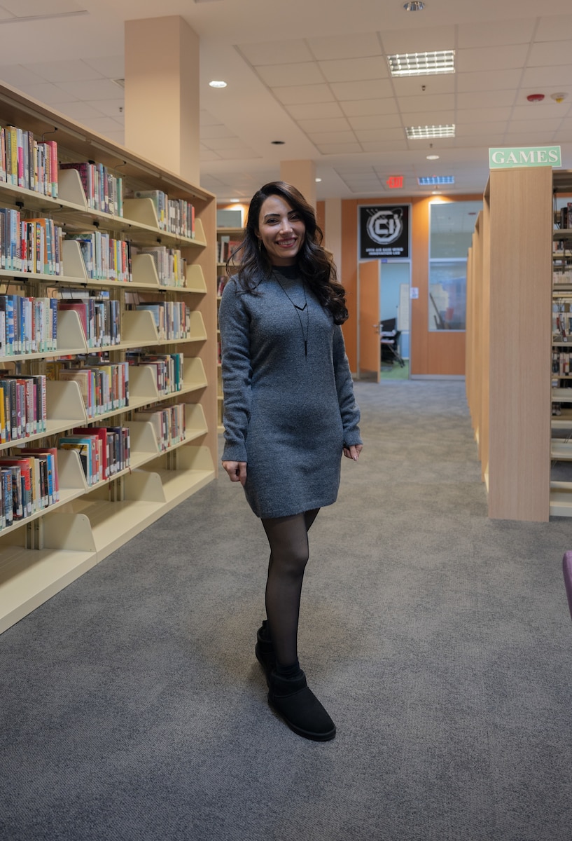 Ezgi Erek, Incirlik Air Base library technician, poses for a photo at Incirlik Air Base, Türkiye, Jan. 30, 2025. Erek leads the weekly Turkish Language and Culture Class, providing service members with essential language skills and cultural knowledge to enhance their experience in Türkiye. (U.S. Air Force photo by Staff Sgt. Nicole Molignano)