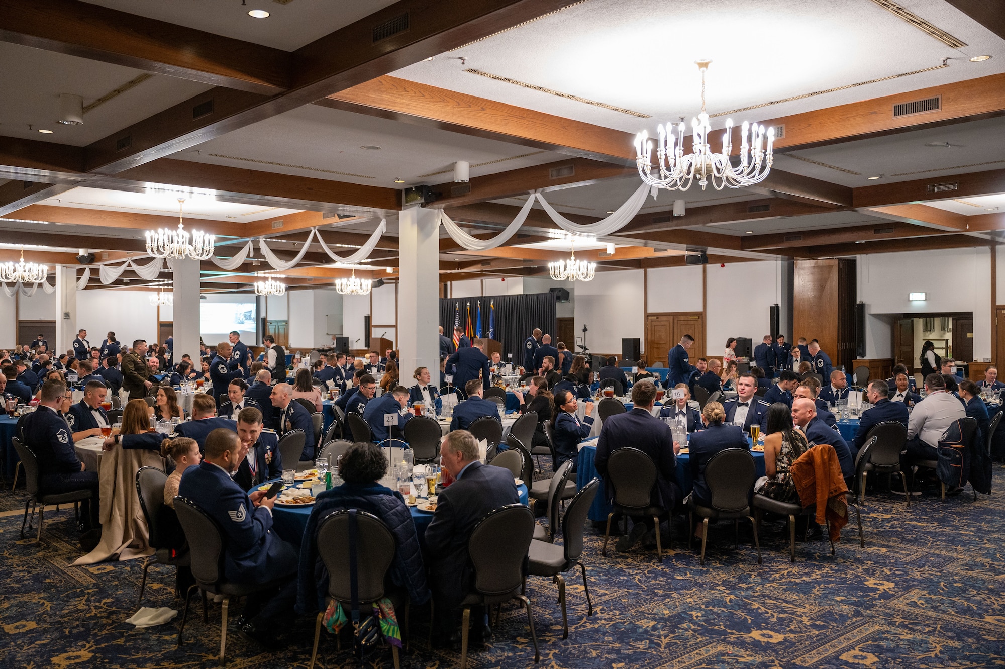 Team Ramstein members attend the 2024 86th Airlift Wing Annual Awards Ceremony at Ramstein Air Base, Germany, Feb. 7, 2025. The annual awards ceremony recognized 12 award winners from the 86th AW as well as all the nominees for their accomplishments and contributions over the past year.