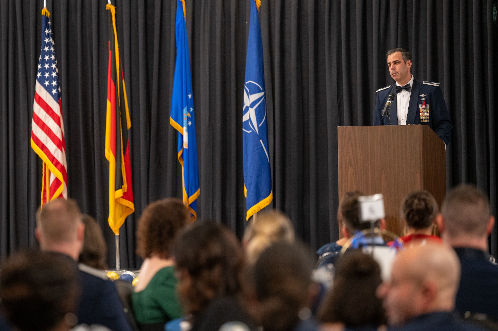 U.S. Air Force Col. Jamil I. Musa, 86th Airlift Wing deputy commander, recognizes the accomplishments of U.S. Airmen and civilians assigned to the 86th AW during an annual awards ceremony at Ramstein Air Base, Germany, Feb. 7, 2025. Annual award nominees were selected based on their work performance and airmanship in 2024.