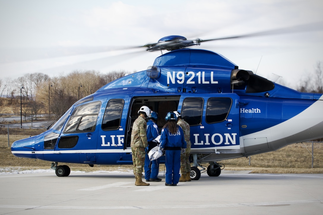 An H115 helicopter, operated by personnel with Penn State Health Life Lion Critical Care Transport, provides aerial medevac for a simulated patient during a mass casualty exercise at Milton S. Hershey Medical Center in Hershey, Pennsylvania, Feb. 7, 2025. This exercise was part of a capstone event for an inaugural two-week training program, which is a new partnership between the National Guard and MSHMC, where participants learn how to respond effectively in emergencies and combat situations. (U.S. Army National Guard photo by Maj. Travis Mueller)