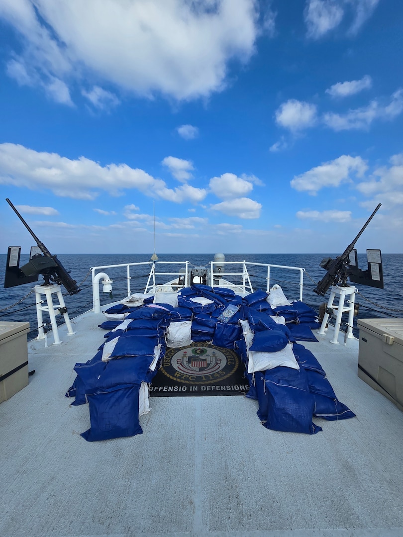250207-N-NO146-1001 ARABIAN SEA (February 7, 2025) Coast Guardsmen from the U.S. Coast Guard Sentinel-class fast response cutter USCGC Emlen Tunnell (WPC 1145) seize illegal narcotics from a stateless vessel in the Arabian Sea. (Official U.S. Coast Guard photo)