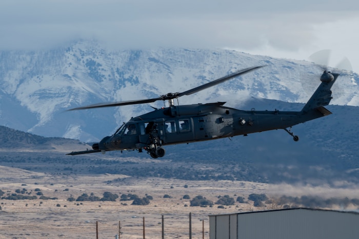 A U.S. Air Force HH-60W Jolly Green II helicopter takes off