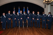 U.S. Air Force Command Chief Master Sgt. Daniel Cain (center), 12th Flying Training Wing, stands with honorees at an induction ceremony for noncommissioned officers at Joint Base San Antonio-Randolph, Texas, Jan. 31, 2025. (U.S. Air Force photo by Kathryn Reaves)