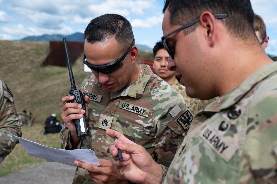 A Joint Task Force-Bravo Civil Affairs Company member calls in a medical evacuation during an air enroute care training at Soto Cano Air Base, Honduras, February 5, 2025. During the three day training members learned how to assess, care for and safely load a patient into a helicopter in case of a medical evacuation. (U.S. Air Force photo by Staff Sgt. Tristan Biese)
