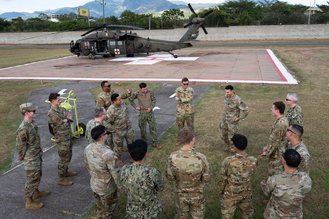 Joint Task Force-Bravo and U.S. Navy Expeditionary Medical Facility 150 Alpha, Camp Pendleton, California, members participate in an air enroute care training at Soto Cano Air Base, Honduras, February 5, 2025. During the three day training members learned how to assess, care for and safely load a patient into a helicopter in case of a medical evacuation. (U.S. Air Force photo by Staff Sgt. Tristan Biese)