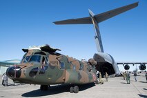A Japan Ground Self-Defense Force CH-47JA Chinook helicopter assigned to the 1st Helicopter Brigade sits on the flightline before loading onto a U.S. Air Force C-17 Globemaster III in support of Keen Sword 25 at Naval Air Facility Atsugi, Feb. 4, 2025.