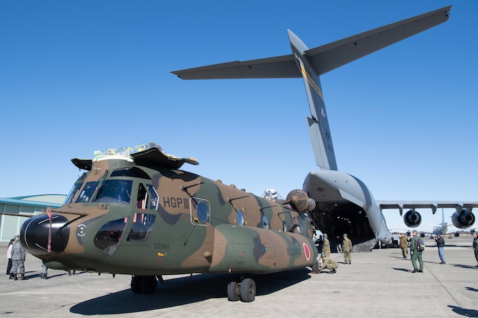 A Japan Ground Self-Defense Force CH-47JA Chinook helicopter assigned to the 1st Helicopter Brigade sits on the flightline before loading onto a U.S. Air Force C-17 Globemaster III in support of Keen Sword 25 at Naval Air Facility Atsugi, Feb. 4, 2025.