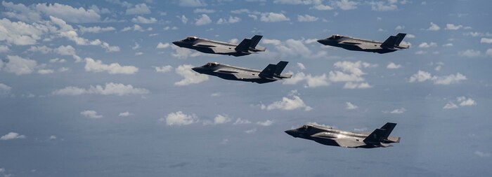 A U.S. Air Force F-35A Lightning II is flanked from top to bottom by a Royal Australian Air Force F-35A, a Japan Air Self Defense Force F-35A and a U.S. Marine Corps F-35B Lightning II during a formation over the U.S. Indo-Pacific Command area of responsibility, Feb. 7, 2025,