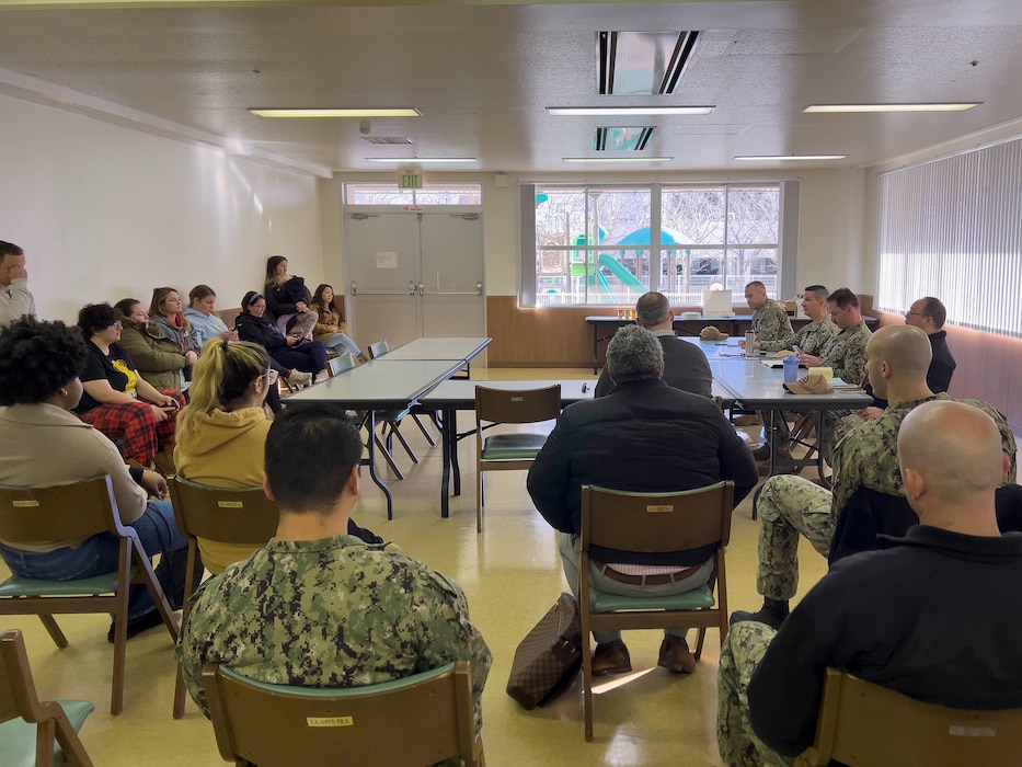 Capt. Les Sobol, Commander, Fleet Activities Yokosuka, and his staff discuss matters concerning Ikego Heights Family Housing community members during the installation's monthly Cup of Joe with the CO event in Ikego's Nikko Tower Community Room.