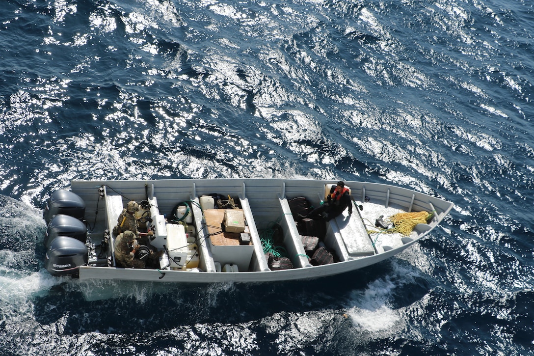 Members of LEDET 103 and U.S. Coast Guard Cutter Waesche (WMSL 751) seized control of a Go-Fast vessel interdicted in the Eastern Pacific Ocean, Feb. 3, 2025. Waesche seized around 1,570 kgs of cocaine and apprehended three suspected drug smugglers  with the assistance of HITRON 25-03, PACTACLET LEDET 103, and ScanEagle team. (U.S. Coast Guard photo by LTJG Julia VanLuven)