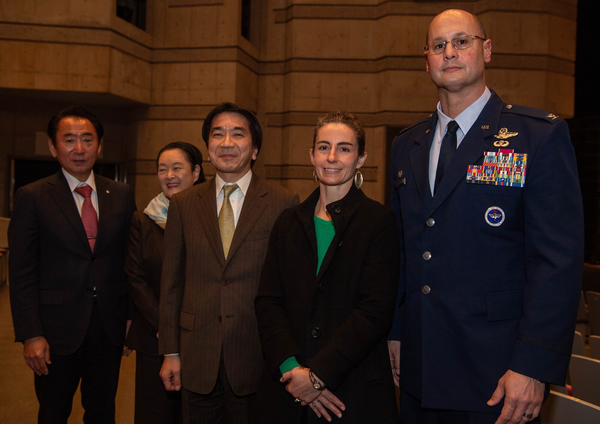 A group of people pose for a photo.