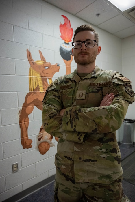 An Airman poses for a portrait