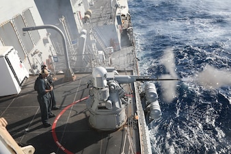 USS Jason Dunham (DDG 109) conducts a pre-action calibration fire in the U.S. Central Command area of responsibility.