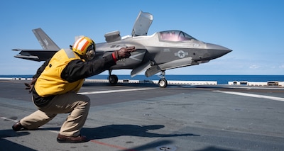 USS America (LHA 6) flight operations in the Philippine Sea.