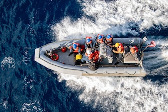 USS America (LHA 6) small boat operations in the Philippine Sea.