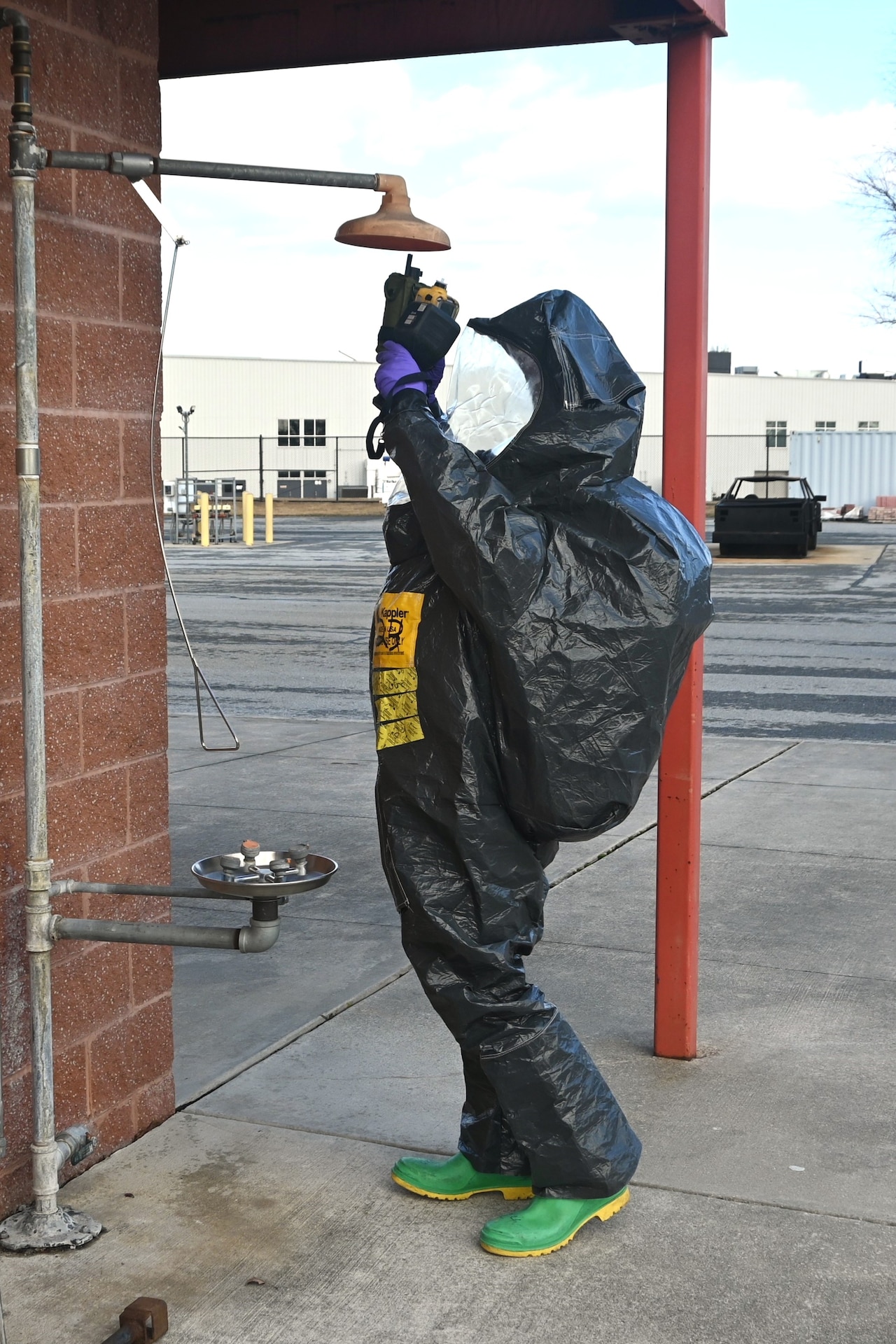 A member of the Pennsylvania National Guard’s 3rd Weapons of Mass Destruction Civil Support Team inspects the outside of a suspected drug lab during a training exercise Feb. 7, 2025, at the Lancaster County Public Safety Training Center in Landisville, Pa. (Pennsylvania National Guard photo by Brad Rhen)