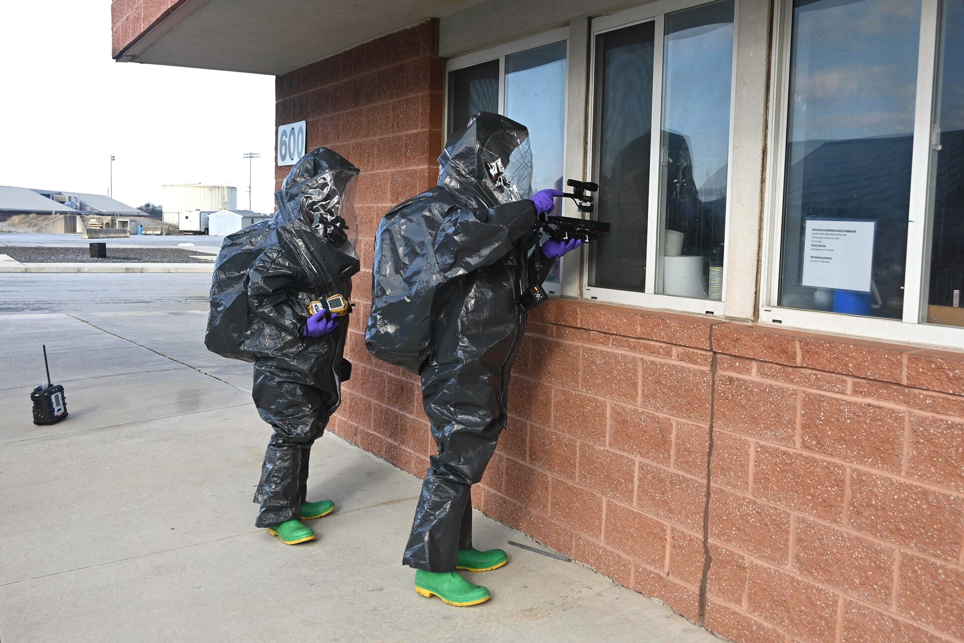 Members of the Pennsylvania National Guard’s 3rd Weapons of Mass Destruction Civil Support Team inspect the outside of a suspected drug lab during a training exercise Feb. 7, 2025, at the Lancaster County Public Safety Training Center in Landisville, Pa. (Pennsylvania National Guard photo by Brad Rhen)