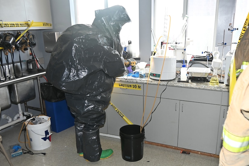 A member of the Pennsylvania National Guard’s 3rd Weapons of Mass Destruction Civil Support Team inspects a suspected drug lab during a training exercise Feb. 7, 2025, at the Lancaster County Public Safety Training Center in Landisville, Pa. (Pennsylvania National Guard photo by Brad Rhen)