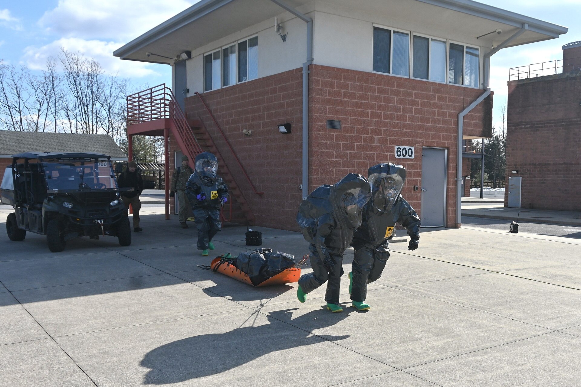 Members of the Pennsylvania National Guard’s 3rd Weapons of Mass Destruction Civil Support Team remove a team member who simulated a medical emergency during a training exercise Feb. 7, 2025, at the Lancaster County Public Safety Training Center in Landisville, Pa. (Pennsylvania National Guard photo by Brad Rhen)
