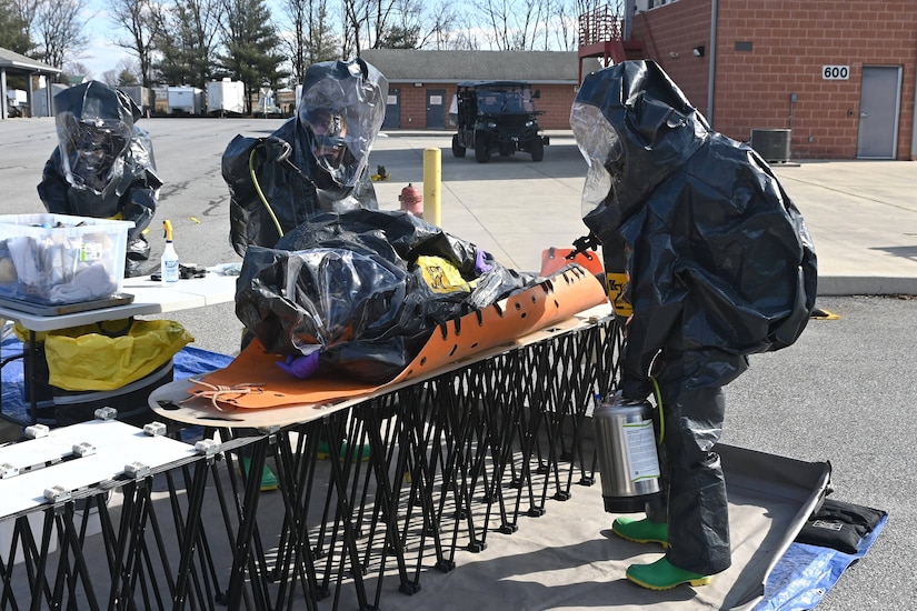 Members of the Pennsylvania National Guard’s 3rd Weapons of Mass Destruction Civil Support Team decontaminate a team member who simulated a medical emergency during a training exercise Feb. 7, 2025, at the Lancaster County Public Safety Training Center in Landisville, Pa. (Pennsylvania National Guard photo by Brad Rhen)